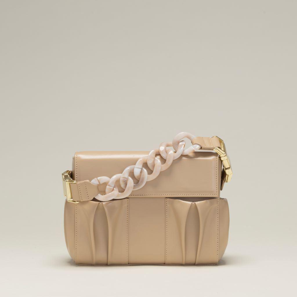 Marmoleada beige con piel Beige